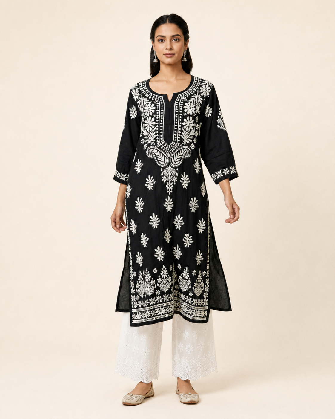 Full-length model wearing Black Modal Chikankari Kurti