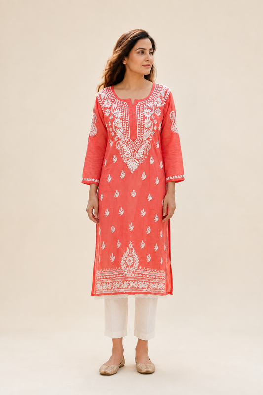 Full-length model wearing Coral Red Modal Chikankari Kurti