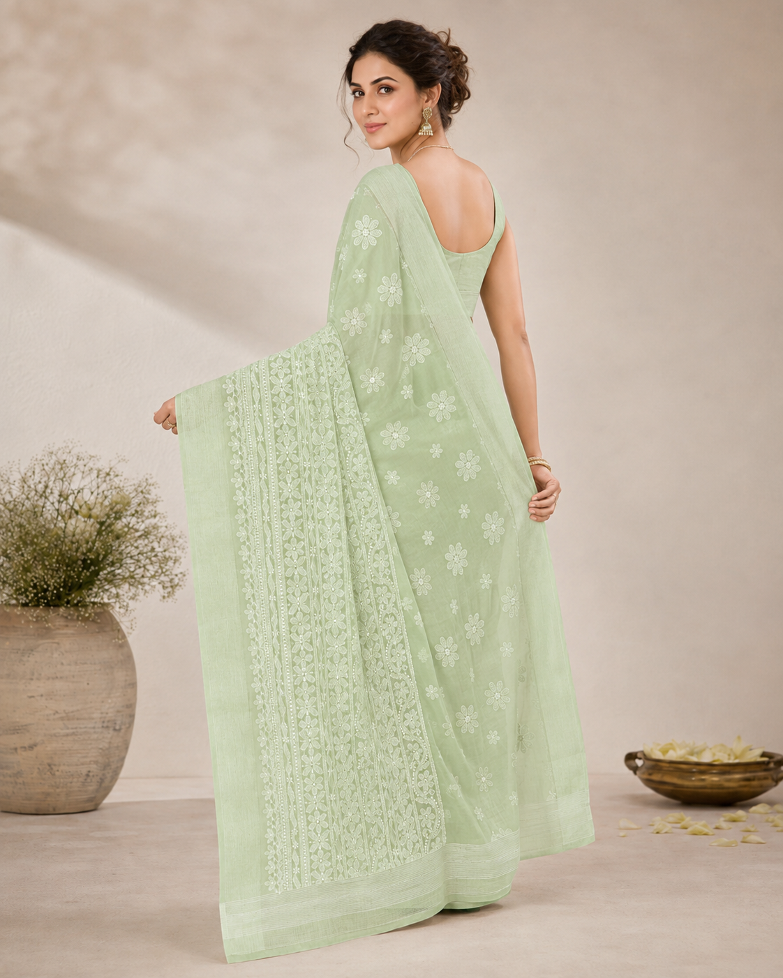 Pista green Chanderi Chikankari saree back view with embroidered pallu