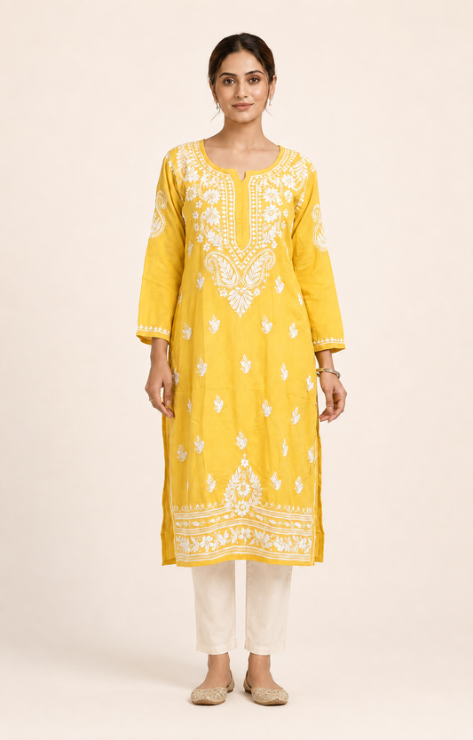 Full-length model wearing Yellow Modal Chikankari Kurti
