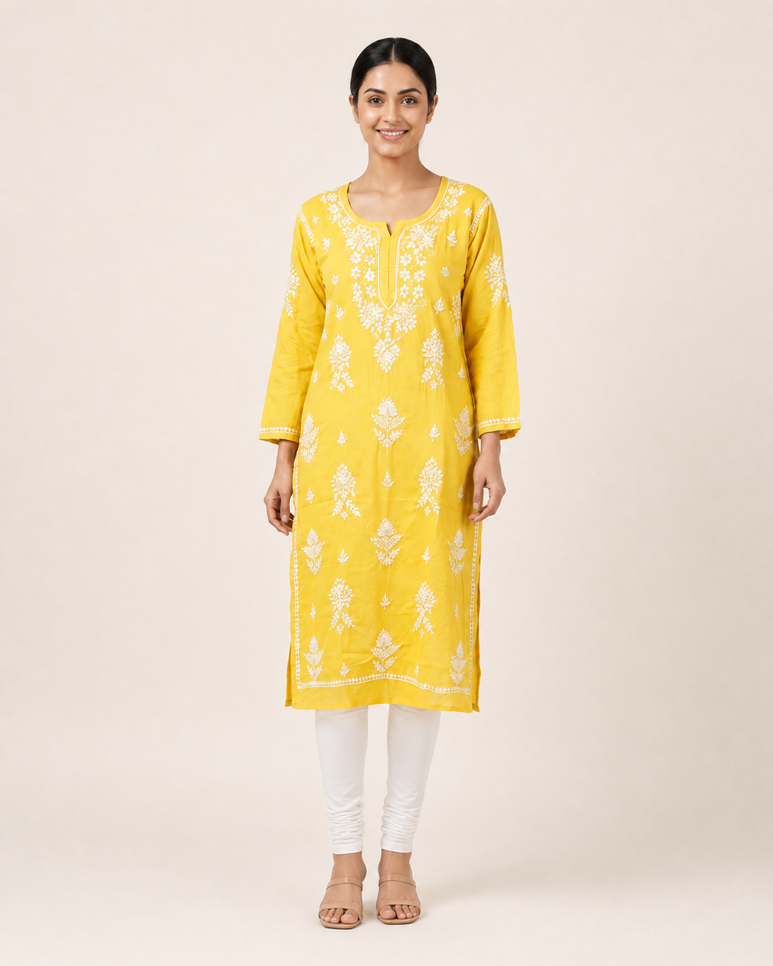 Full-length model wearing Yellow Rayon Chikankari Kurti